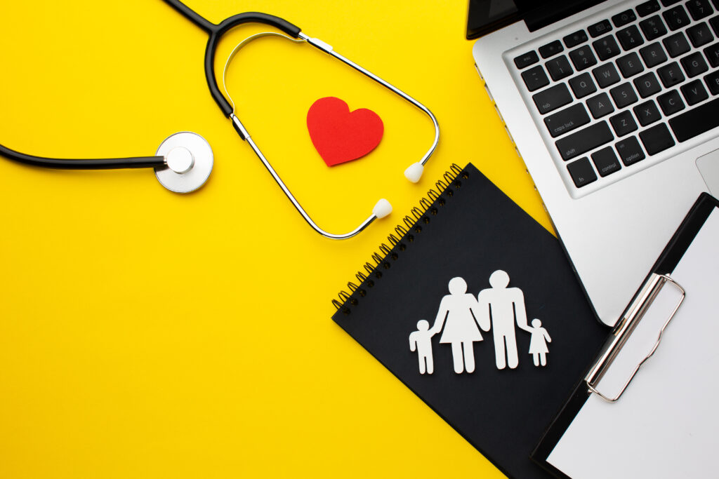 top-view-stethoscope-with-paper-family-figure-scaled-medical-insurance